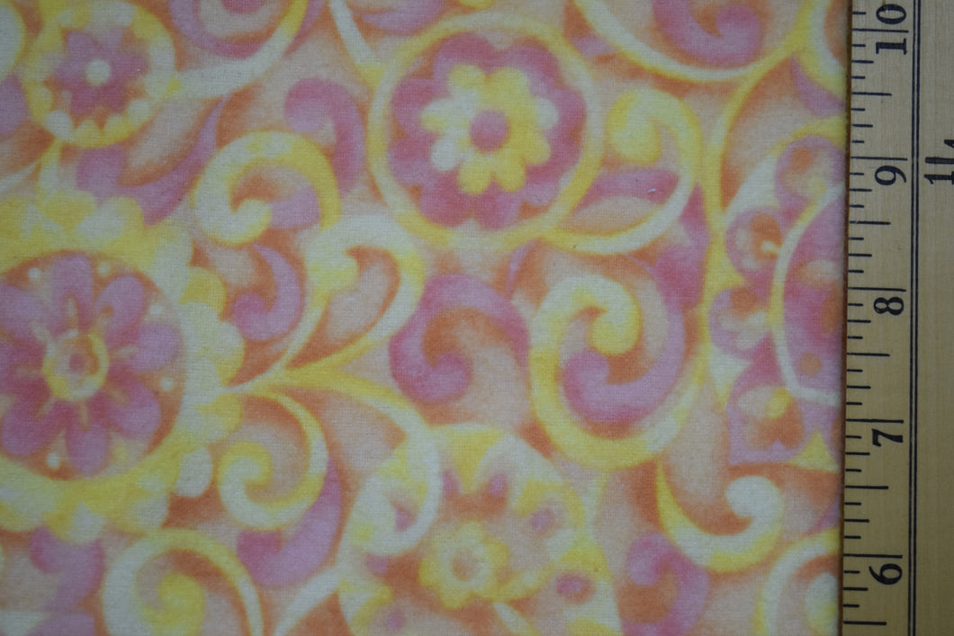 Yellow stylized flowers and curls on shades of pink background. 